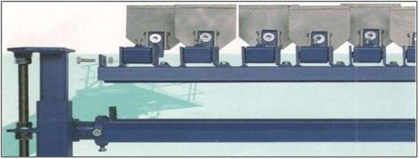 Multiblade Scrapers with individual suspensions using steel with tungsten carbide tip. 